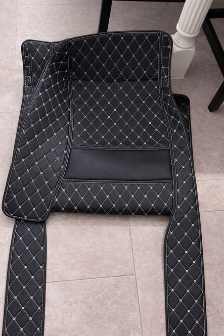 Custom floor mats in Sophia Martinez's Honda Civic